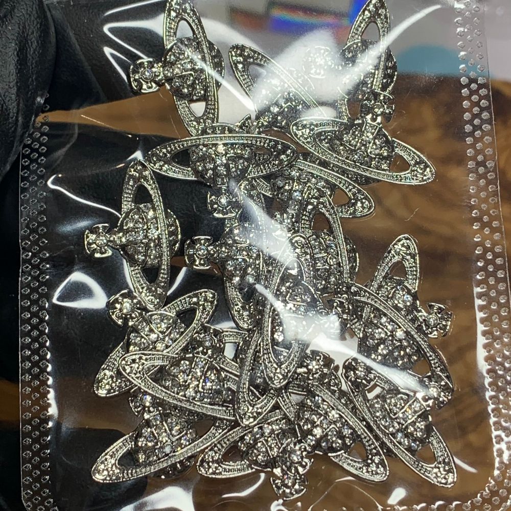 silver planet nail charms in bag - 2