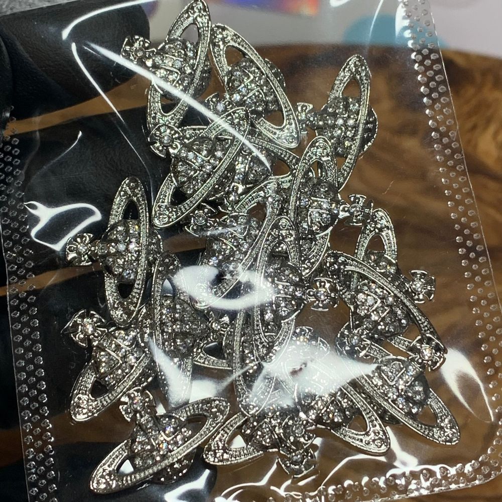 silver planet nail charms in bag - 4
